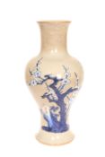 A CHINESE BLUE AND WHITE CELADON-GROUND PORCELAIN VASE, of bold baluster form,