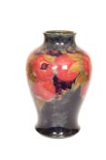 A FINE AND LARGE WILLIAM MOORCROFT VASE IN THE POMEGRANATE PATTERN, of baluster form,