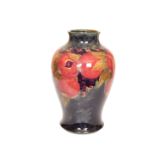 A FINE AND LARGE WILLIAM MOORCROFT VASE IN THE POMEGRANATE PATTERN, of baluster form,