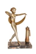 AN ART DECO PATINATED SPELTER DANCING GIRL TABLE LIGHTER,
