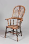 A 19TH CENTURY ELM BROAD-ARM WINDSOR CHAIR, with baluster legs, nice colour.
