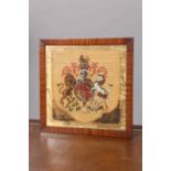 A 19TH CENTURY WOOLWORK AND BEADWORK PANEL, depicting the Royal Coat of Arms, in a mahogany frame.