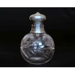 A GEORGE V SILVER-TOPPED CUT-GLASS SCENT BOTTLE, hallmarked for Samuel Jacob, London 1910 (?,