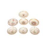 A GROUP OF SEVEN CHINESE ARMORIAL PORCELAIN BOWLS AND SAUCERS, QIANLONG PERIOD,