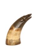 A HORN CUP, the zoomorphic terminal carved with bared teeth.