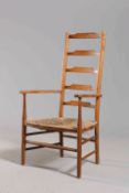 AN ARTS AND CRAFTS "CLISSETT" CHILD'S CHAIR, with ladderback and rush seat.