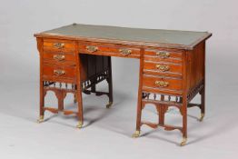 A LATE 19TH CENTURY RED WALNUT DESK,