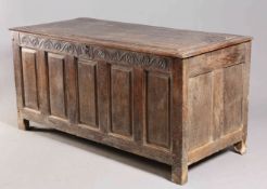 A LARGE OAK CHEST, 17TH/18TH CENTURY, with five panel front and hinged lid.