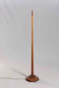 ALAN GRAINGER AN ACORNMAN STANDARD LAMP, with faceted stem and octagonal base,