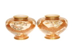 A FINE PAIR OF JAPANESE SATSUMA VASES, MEIJI PERIOD, of squat baluster form,