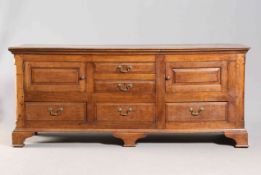 A GEORGE III OAK DRESSER BASE,