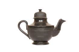 A SMALL 18th CENTURY POTTERY TEAPOT, OF JACKFIELD TYPE, with lustrous black glaze,