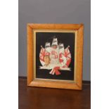 AN EMBROIDERED TRAPUNTO OF THE ROYAL COAT OF ARMS, in a maple frame. Overall 56.