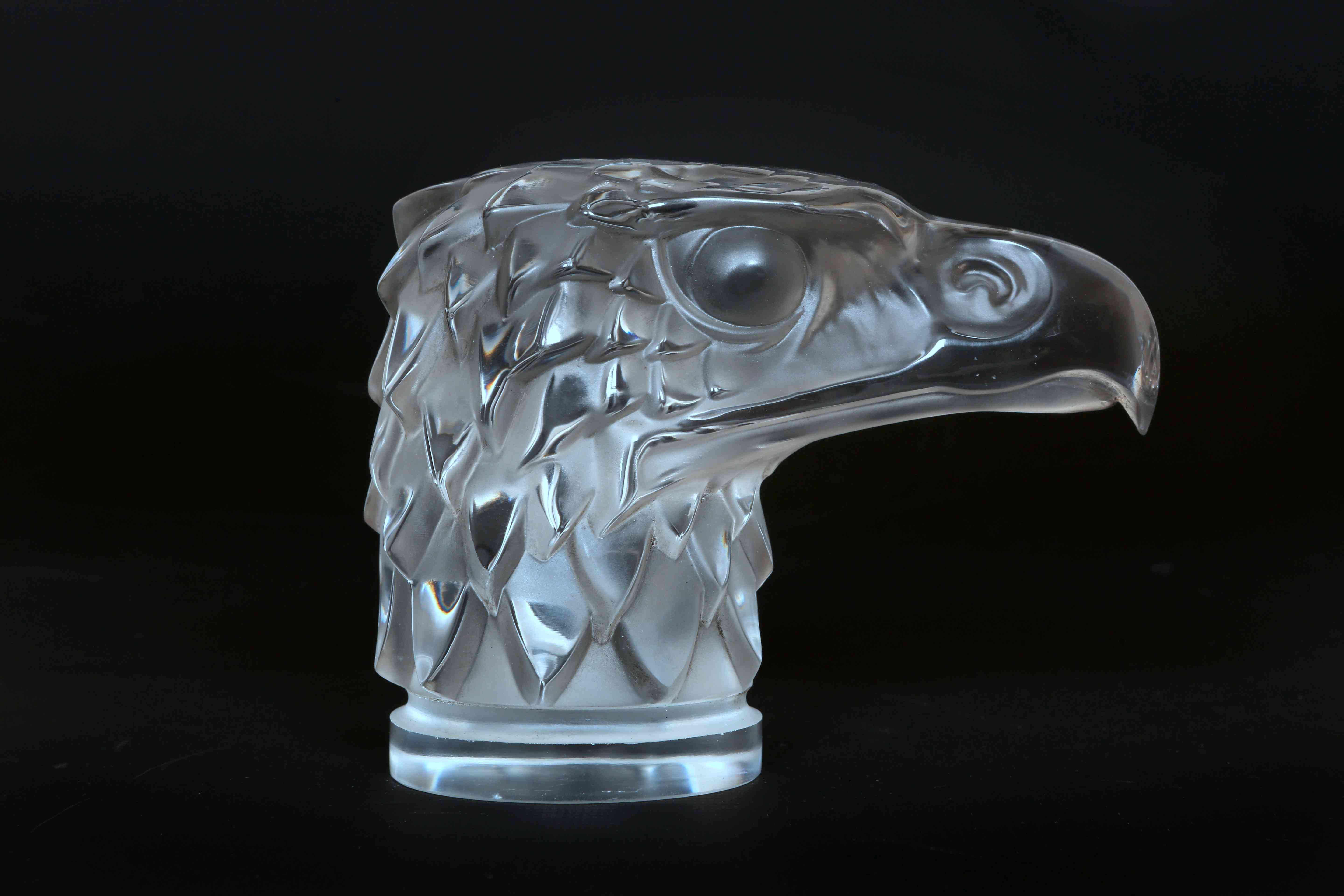 A LALIQUE GLASS TETE D'AIGLE (EAGLE), CAR MASCOT, in clear and frosted glass, moulded "R.