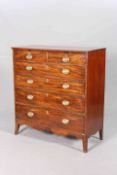 AN EARLY 19TH CENTURY MAHOGANY CHEST OF DRAWERS, with two short over four long graduated drawers,