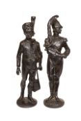 A PAIR OF PATINATED METAL MILITARY FIGURES, of a hussar and a dragoon in early 19th century uniform,