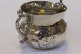 A CHARLES II SILVER TWO-HANDLED PORRINGER, HB conjoined, London 1664,