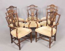 A SET OF EIGHT HEPPLEWHITE STYLE MAHOGANY DINING CHAIRS, including a pair of carvers,