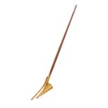 A BRASS LONG-ARM CANDLE SNUFFER, with conical snuffer and taper light, on a wooden pole.