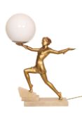 AN ART DECO FIGURAL GILT-METAL TABLE LAMP, modelled as a girl in Pierrette costume,