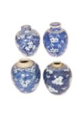 FOUR CHINESE BLUE AND WHITE PORCELAIN JARS, decorated with hawthorn,