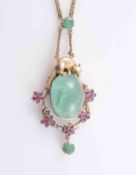 AN EMERALD AND RUBY PENDANT,