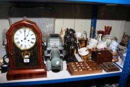 Shelf clock, editions of The War Papers, projector, two lamps, watch stand and watches, wall rack,