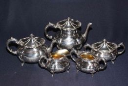 Silver plate five piece tea and coffee service with scroll borders