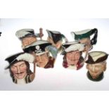 Seven Royal Doulton character jugs including Dick Turpin and Robin Hood