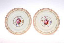 Pair Tiffany & Co. porcelain plates with painted bouquets, signed W.