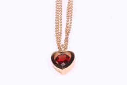 18 carat yellow gold garnet heart shaped pendant on triple 18 carat gold chain