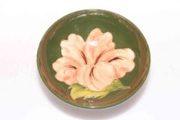 Moorcroft coral hibiscus on green ground bowl