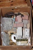 Box of various clock parts, weights, crystal drops, vintage train tickets,