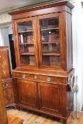 19th Century mahogany and brass strung cabinet bookcase having two glazed panel doors above two