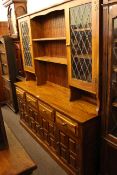 Elm finish leaded glazed door and shelf back dresser