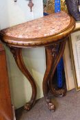 Carved mahogany and marble topped demi lune console table,