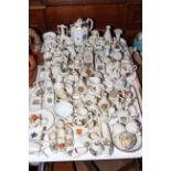 Collection of approximately one hundred pieces of crested china