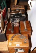 Six wooden cased pigeon timing clocks