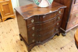 Mahogany shaped front chest of four long drawers on bracket feet, 87.