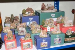 Collection of twenty two boxed Lilliput Lane cottages, churches,