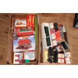 Two boxes of model railway engines, rolling stock,