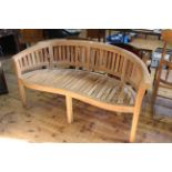 As new serpentine front seated garden bench,