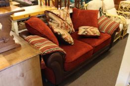 Brown leather and fabric two seater settee