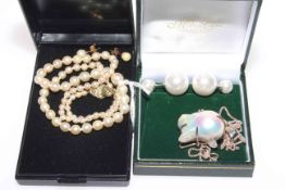 Pearl necklace and matching earrings,