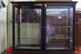 Ebonised table top display cabinet with mirrored floor and four glass shelves,