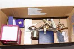 Box with silver folding knife, corkscrews,