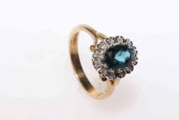 9 carat gold blue topaz and round brilliant cut diamond cluster ring with split shank and leaf