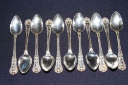 Set of Eleven Victorian Scottish silver teaspoons with ornate handles