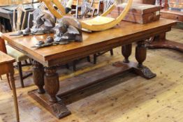 Large marquetry topped oak draw leaf dining table raised on carved twin columns to each end