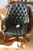 Green deep buttoned and studded swivel desk chair